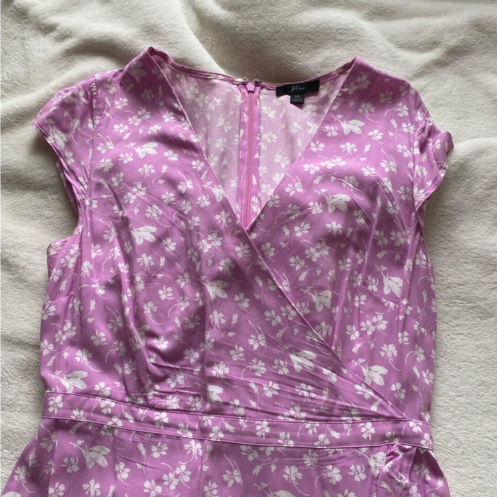 pink and white floral mini dress with ruffles a wrap style and a b neck jcrew